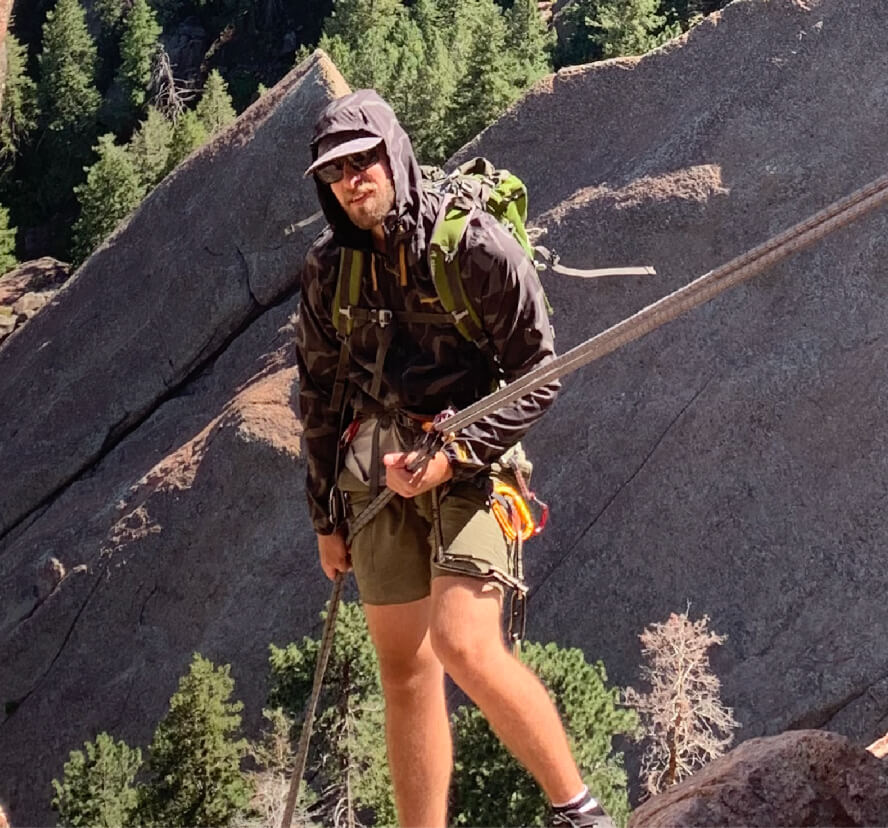 Zane Decker rock climbing